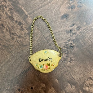Vintage brandy bottle tag
