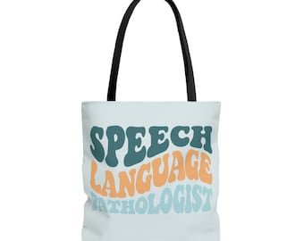May include: A light blue tote bag with black handles. The bag has the text "SPEECH LANGUAGE PATHOLOGIST" in a retro font with blue, green, and orange colors.