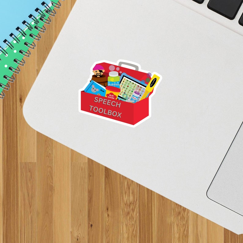 May include: A red toolbox with the words "Speech Toolbox" on the front. The toolbox is filled with various speech therapy tools, including a pirate puppet, bubbles, a picture card deck, and a play dough set.