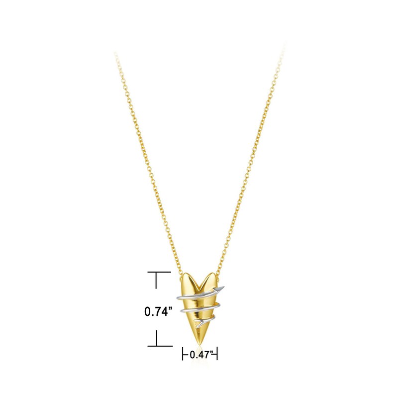 May include: A gold chain necklace with a two-tone heart pendant. The heart is made of gold and silver and has a twisted design with an arrow piercing through it. The pendant measures 0.74 inches tall and 0.47 inches wide.