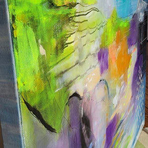 May include: Abstract painting with vibrant colors, including green, purple, blue, and orange. The painting features bold brushstrokes and a dynamic composition.