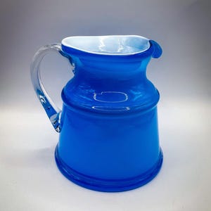Vintage Blue and White Encased Glass Pitched
