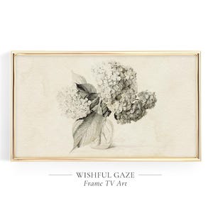 May include: A black and white drawing of a bouquet of hydrangeas in a glass vase. The drawing is framed in a gold frame and has the text "Wishful Gaze Frame TV Art" below the image.
