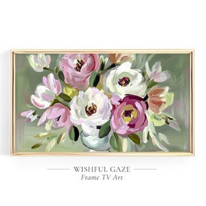 May include: A framed floral painting with a gold border. The artwork features a bouquet of pink, white, and burgundy flowers in a vase against a green background. The text "WISHFUL GAZE Frame TV Art" is below the painting.
