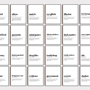 May include: A collection of 24 framed art prints with black frames and white backgrounds. Each print features a word in a bold, sans-serif font, such as "decoded" or "aliens", with a brief definition below. The overall theme is related to mystery and intrigue.