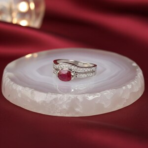#RubyEngagementRing #JulyBirthstone #BridalSet #RedGemstoneRing #VintageJewelry #AlternativeEngagementRing #WhiteGoldRuby #WeddingRingSet #UniquePromiseRing #ArtDecoJewelry #GiftForHer #AnniversaryGift #RubyWeddingBand #StatementRing #EtsyJewelry