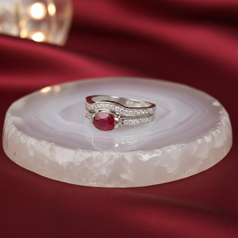#RubyEngagementRing #JulyBirthstone #BridalSet #RedGemstoneRing #VintageJewelry #AlternativeEngagementRing #WhiteGoldRuby #WeddingRingSet #UniquePromiseRing #ArtDecoJewelry #GiftForHer #AnniversaryGift #RubyWeddingBand #StatementRing #EtsyJewelry