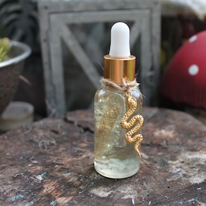 Snake Skin Oil, Crystal Infused, Snake Magic, Serpent Magic, Ritual Oil, Spell Oil, Medusa, Rebirth, power and transformation ritual