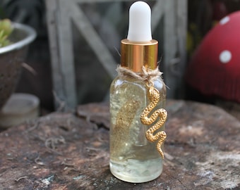 Snake Skin Oil, Crystal Infused, Snake Magic, Serpent Magic, Ritual Oil, Spell Oil, Medusa, Rebirth, power and transformation ritual