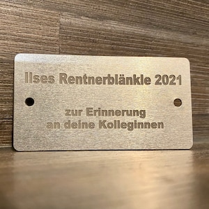 Aluminium shield with individual engraving