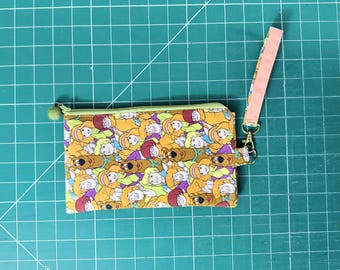 Cartera de mano para móvil con diseño de perro de dibujos animados Y2K – Estuche retro reciclado con cremallera, bolso vintage hecho a mano con un toque nostálgico.