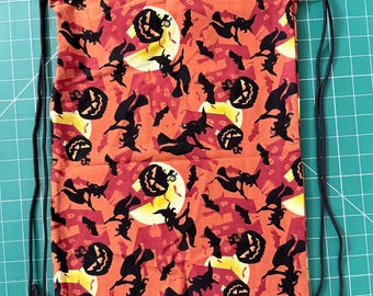 Mochila con cordón y silueta de bruja – Bolsa de Halloween con cordón, estampado de calabaza naranja y murciélago
