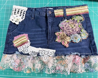 Upcycled Denim Mini Skirt | Size 12 | Crochet Lace, Tapestry-Patch, Floral Hem Boho-Grunge Reworked Jeans