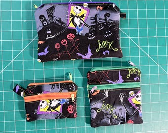 Conjunto de estuche con cremallera de esqueleto – Monedero gótico espeluznante de Halloween con monedas, auriculares, murciélagos reciclados, cementerio