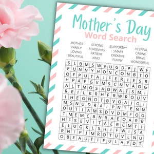 Peut inclure: Un puzzle de mots crois&eacute;s imprimable pour la f&ecirc;te des m&egrave;res avec une bordure ray&eacute;e rose et bleue. Le puzzle pr&eacute;sente des mots li&eacute;s aux m&egrave;res, tels que "aimant", "attentionn&eacute;", "patient" et "fort".