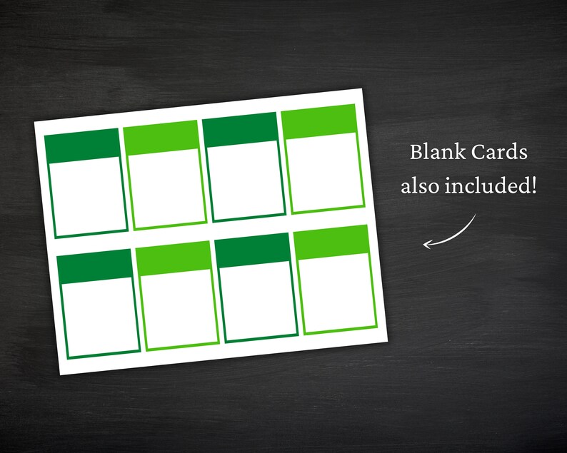May include: A sheet of white blank cards with a green and light green border. The text "Blank Cards also included!" is written in black. The cards are on a black surface.