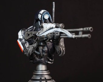 May include: A detailed bust of a futuristic soldier holding a rifle. The soldier is wearing a black and white suit with a blue visor. The bust is made of metal and has a weathered finish.