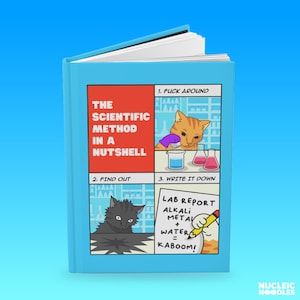 May include: A hardcover book with a light blue cover. The book's cover features a comic strip illustrating "The Scientific Method in a Nutshell." The comic strip shows cats performing science experiments. The text includes "FUCK AROUND," "FIND OUT," and "WRITE IT DOWN."