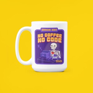 May include: White ceramic coffee mug with a purple and yellow design featuring a skeleton sitting at a computer with the text "ERROR 404 NO COFFEE NO CODE" and "NUCLEIC NOODLES".