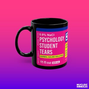 May include: Black ceramic mug with a white label that reads "0.9% NaCl Psychology Student Tears Normal Saline Solution 11 fl oz 325 mL".