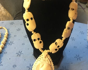 Chinese carved bone elephant necklace