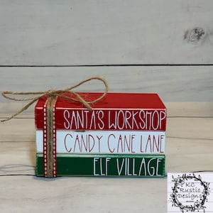 Christmas mini wood book stack/ Santa’s workshop/ tiered tray decor/ Elf Village/ Candy Cane Lane/ book bundle/ Christmas decor/