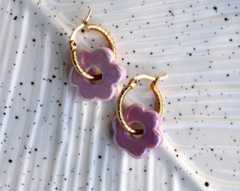Golden stainless steel hoop earrings with ceramic flowers