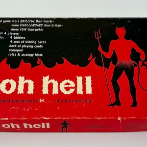 May include: A red and black game box with a devil illustration and the text "oh hell" in white. The box says "Like the old favorite but a H... of a lot more fun!"