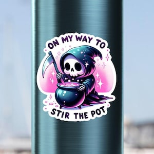 May include: A blue water bottle with a sticker of a cartoon Grim Reaper stirring a cauldron with the text "On my way to stir the pot".