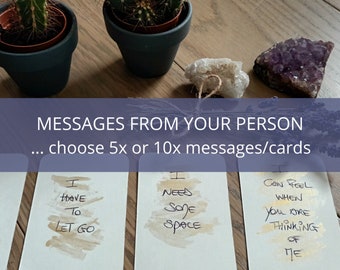 May include: White cards with handwritten messages, including "I HAVE TO LET GO" and "I NEED SOME SPACE." The cards are part of a set, with the text "MESSAGES FROM YOUR PERSON" above them. The cards are on a wooden surface.