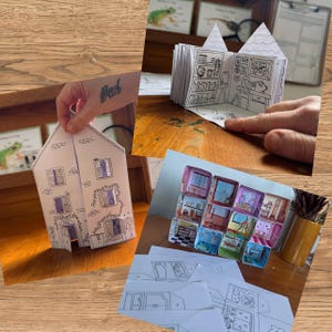May include: A paper craft kit featuring a foldable house structure with black and white line art illustrations of rooms, including bookshelves, desks, and windows, alongside a set of colourful, pre-printed miniature room dioramas on paper sheets.