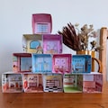 Stackable, cube, miniature paper dollhouse: with both plain and coloured templates product logo
