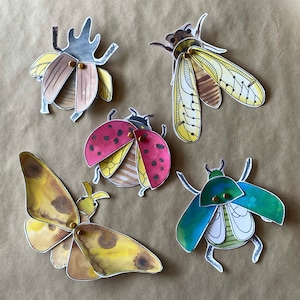 Insectos mecánicos de papel