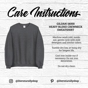 May include: A dark gray Gildan 18000 Heavy Blend Crewneck Sweatshirt. The image includes care instructions: machine wash cold, tumble dry low, cool iron inside-out if necessary, and do not dry clean. The shop's social media handles are also visible.