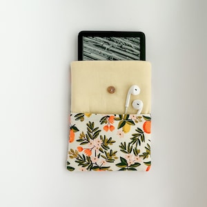 Yellow kindle case with floral print with lemons and oranges