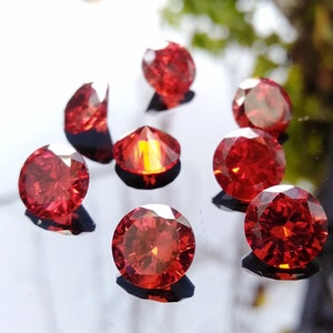 Cubic Zirconia AAA Quality Cubic Zirconia Round shape Garnet Red Color CZ Loose Stones (0.5mm - 15mm) Cubic Zirconia