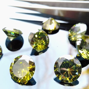 Cubic Zirconia AAA Quality Cubic Zirconia Round shape Olive Green Color CZ Loose Stones (1mm - 15mm)
