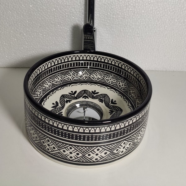 Discover the latest trend in bathroom elegance with our Trending black and white Moroccan Round Vessel Sink