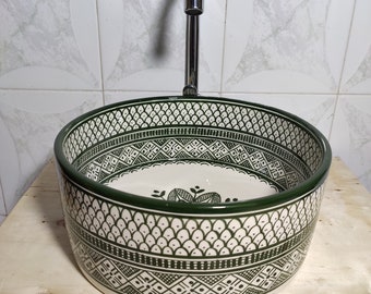 Discover the latest trend in bathroom elegance with our Trending Green Moroccan Round Vessel Sink