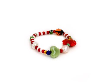 Charm Bracelet | Lady Luck Beaded Stretch Bracelet | Flower, Pearl & Evil Eye Bracelet