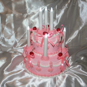 Vintage-Style Pink and White Two Tier Fake Cake with Pink Bows, Cherries, and LED Candles! Super Cute and Unique Accent Home Decor!