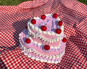 Vintage-Style Pink, Purple, and White Two-Tier Heart Shaped Fake Cake with Cherries! Includes FREE Accessory!