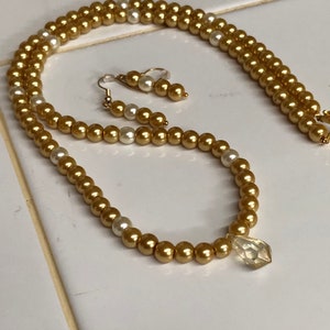 Yellow pearls with clear yellow teardrop pendant for women with gold clasp, 24 in necklace and earrings set