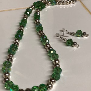 large green crystals with silver metal beads 20 in necklace and earrings set