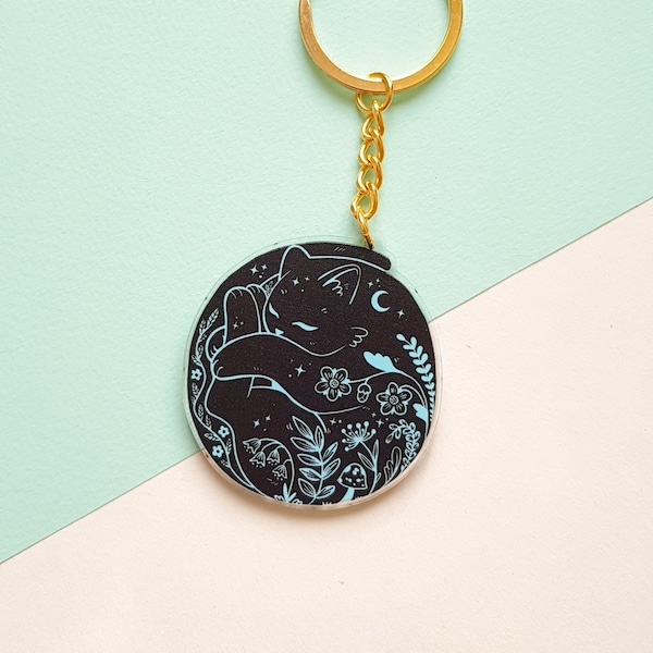 Sleeping black cat keychain - transparent acrylic charm