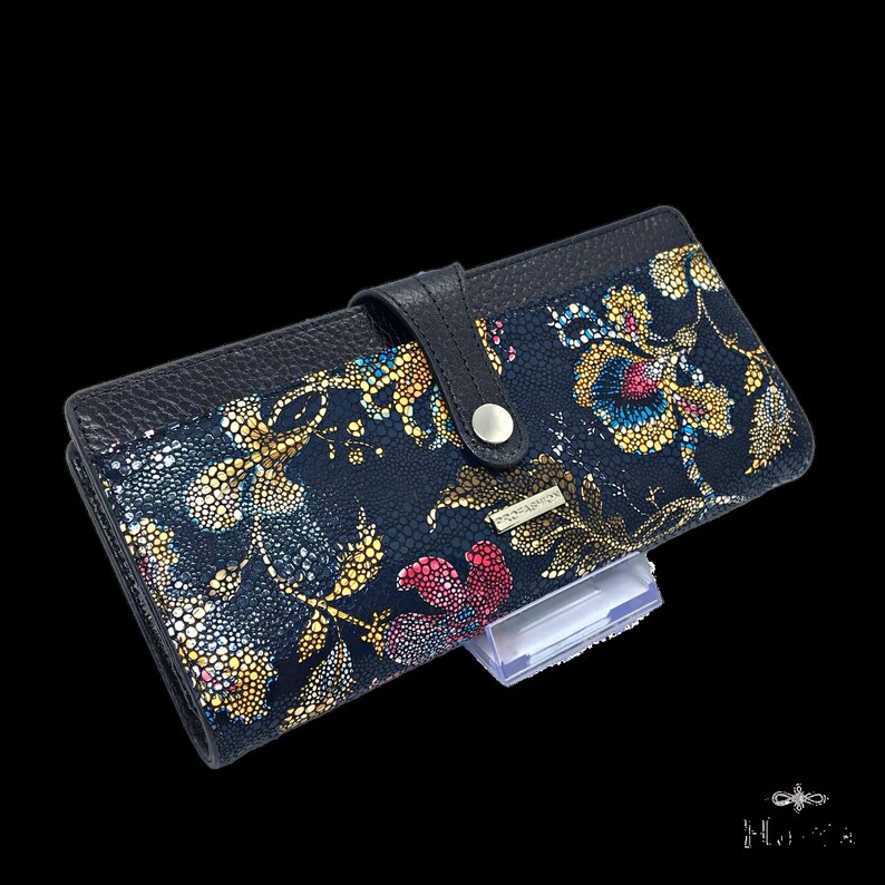 a wallet with a flower design on it