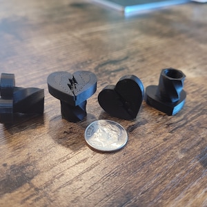 Broken Heart Tire Valve Stem Caps, Black. Available in several Colors. 3D printed Eco Friendly Material. Schrader Valve cover. Ships Fast