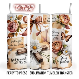 May include: A white sublimation tumbler featuring floral and cross designs with inspirational quotes. The tumbler includes roses, daisies, and a butterfly. Text includes "Just a girl who love Jesus", "God is good all the time", "Strong women pray", and "She is fearless".