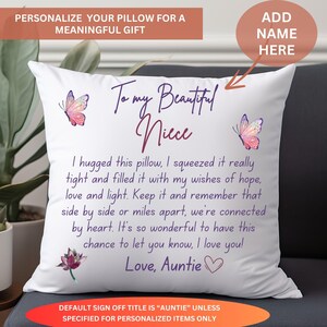 May include: White square cushion with a personalized message for a niece. The cushion features butterfly and flower illustrations, with text that reads "To my Beautiful Niece" and a message from "Auntie".
