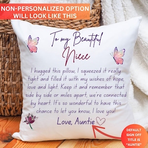 May include: White decorative cushion with the text "To my Beautiful Niece" and a message of love. Features butterfly and flower illustrations. The text includes "Love, Auntie".
